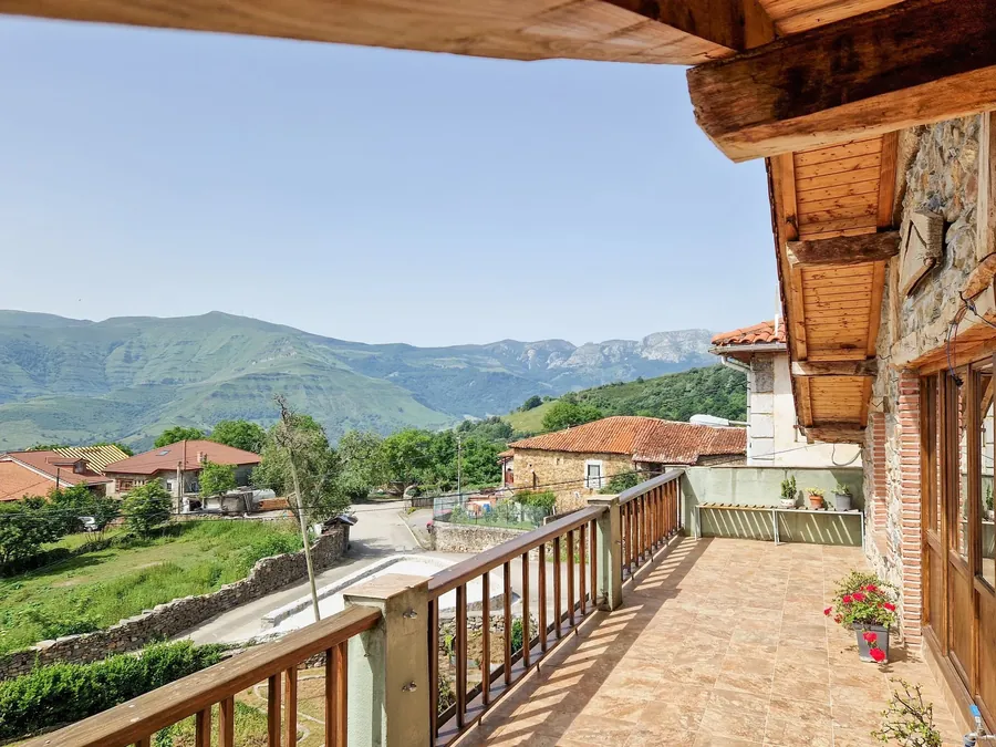 Panoramic valley view from the traditional wooden viewing deck